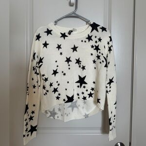 H&M crew-neck Sweater with black stars pattern on a white background, size S
